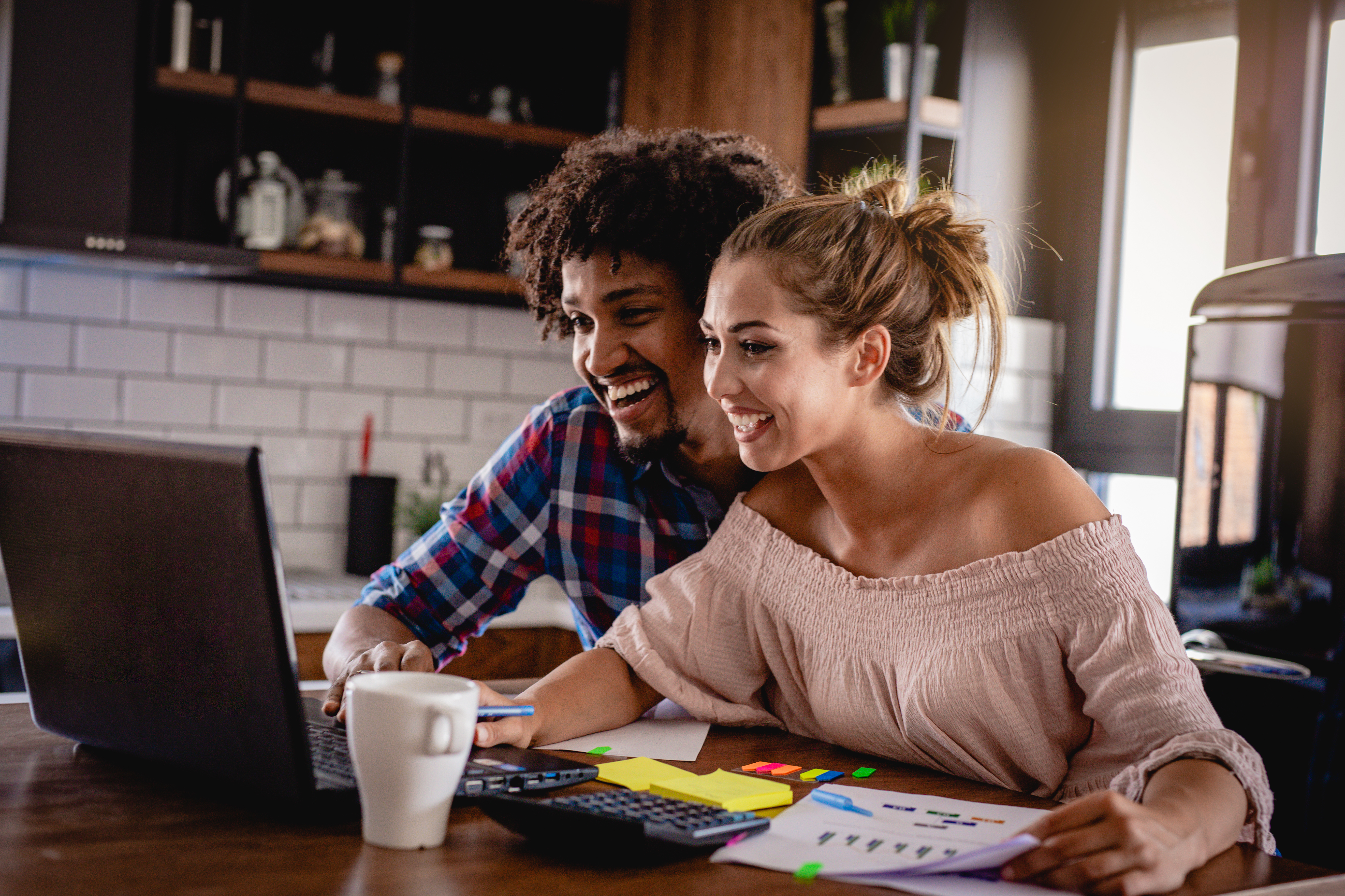 Couples working together on a computer