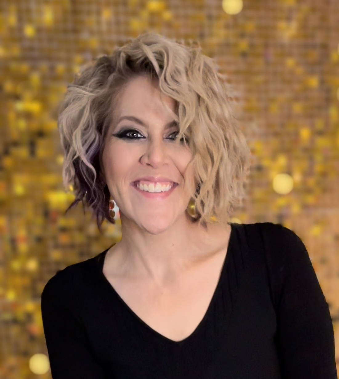 Women headshot, gold background
