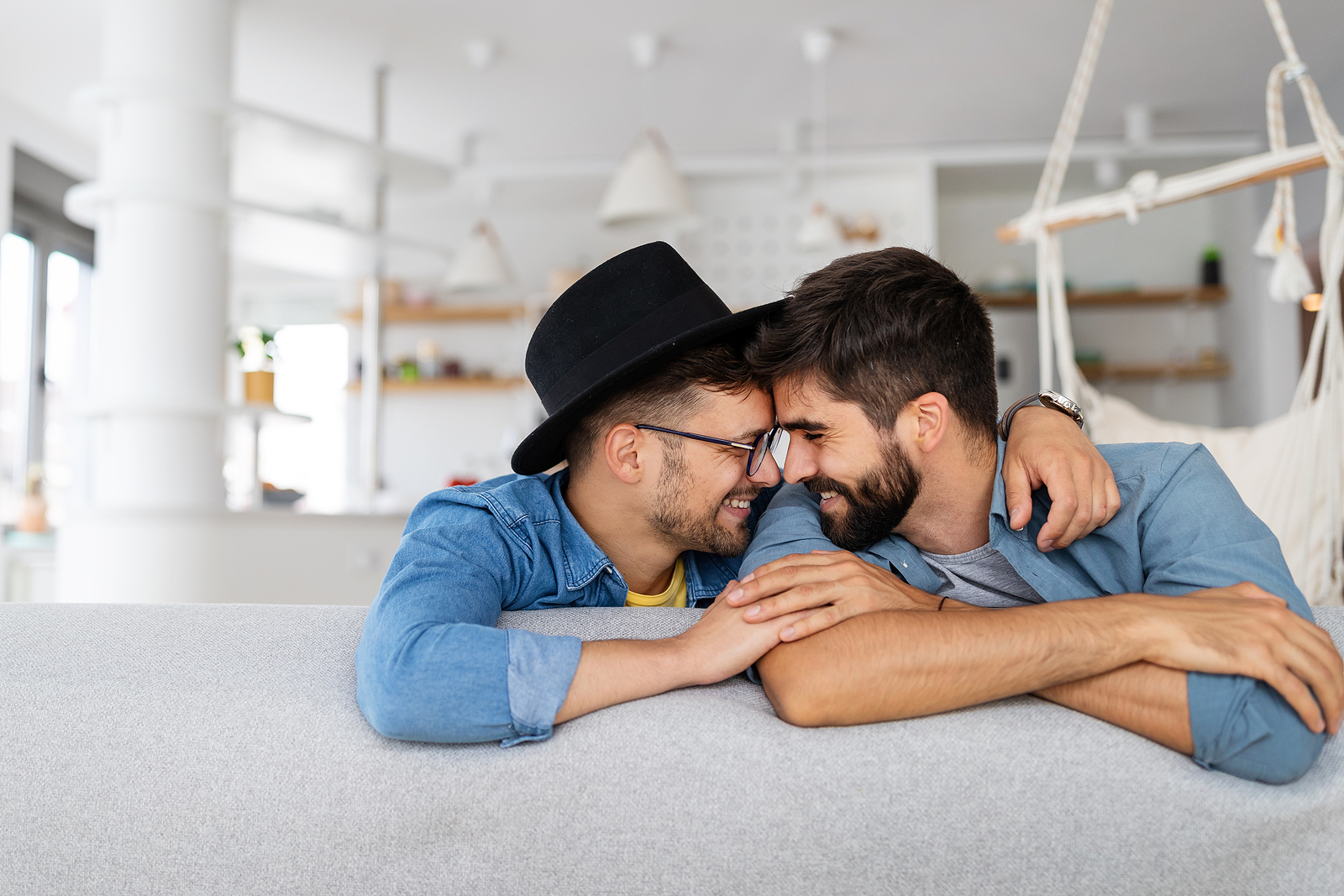 A couple smiles next to each other. This relates to couples counseling in St. Louis, MO. Our marriage counselor in St. Louis, MO can help you through marriage counseling in St. Louis, MO.