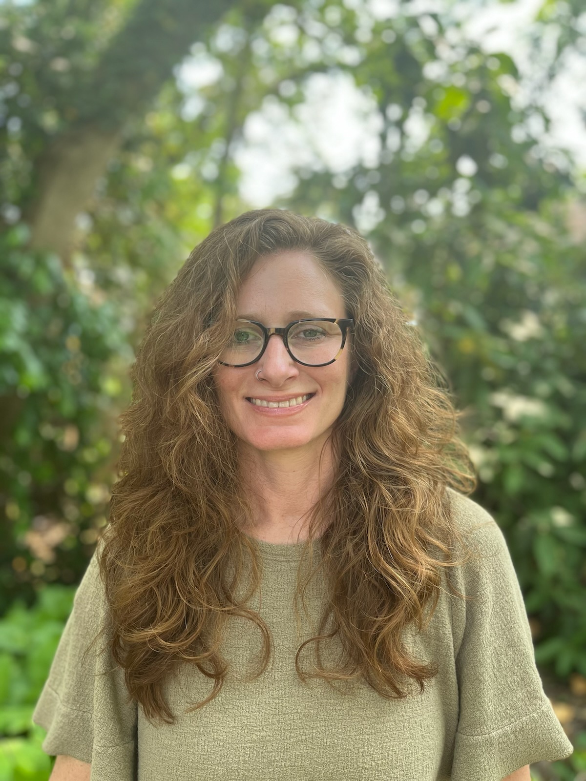 Women glasses smiling trees