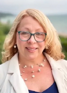 Compassionate Blonde Woman with glasses