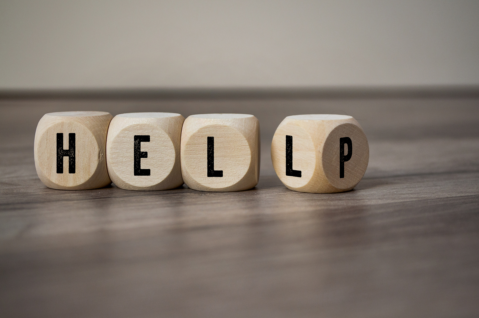 Blocks read &quot;help.&quot; This relates to concepts of trauma therapy in Independence, MO. Our trauma therapist in Independence, MO offer online therapy in Kansas City, MO.