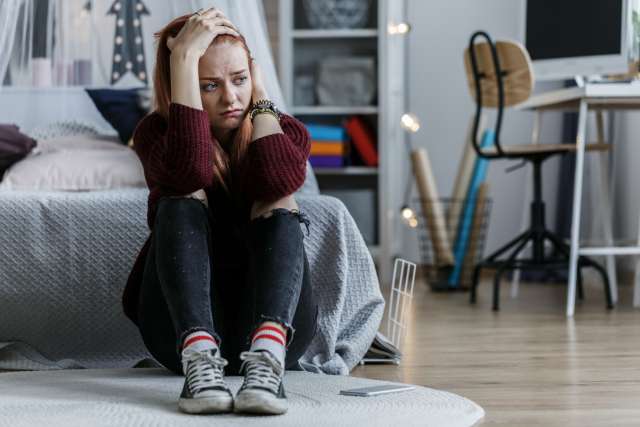 Depressed person looking for help by phone