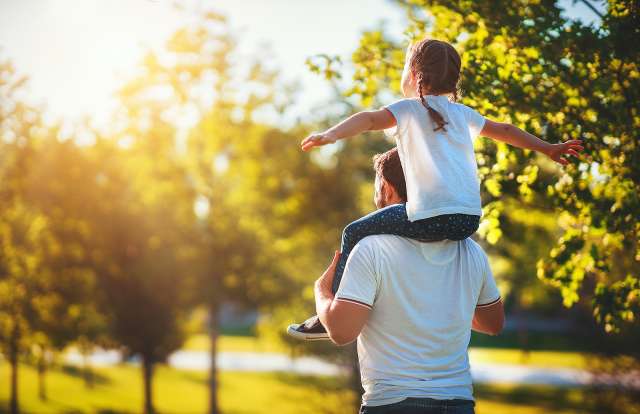 A dad and son walk together. This relates to concepts of child therapy in St. Louis, MO. Our child therapist in St. Louis, MO provide support.