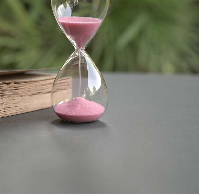 Pink hourglass is shown. This relates to child therapy in St. Louis, MO. Our therapist in St. Louis, MO can provide effective therapy in St. Louis, MO. 