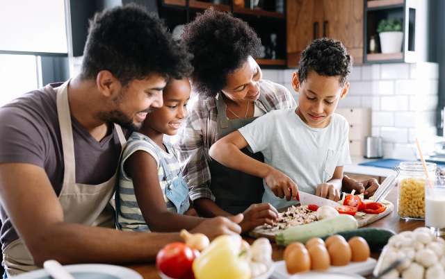 A family is cooking. This relates to ideas of therapy in Independence, MO. Our therapist in Independence, MO offer effective online therapy in Kansas City, MO. 