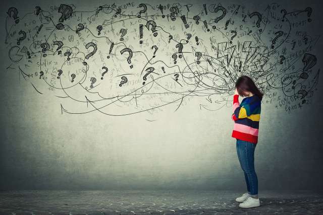 A picture depicts someone feeling overwhelmed. This relates to concepts of trauma therapy in Independence, MO. Our trauma therapist in Independence, MO offer online therapy in Kansas City, MO.