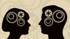 Two silhouetts with gears inside their heads