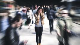 Woman having a panic attack in public