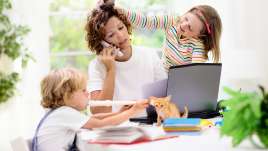 A mom with two kids is shown. This relates to concepts of child therapy in St. Louis, MO. Our child therapist in St. Louis, MO can address sibling rivalry.