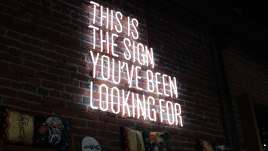 Image of Neon Sign that says "This is the sign you were looking for"